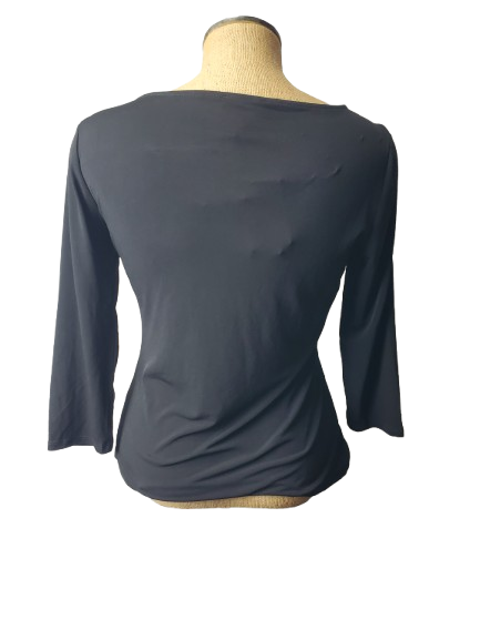 black long-sleeve top on a mannequin with a white background