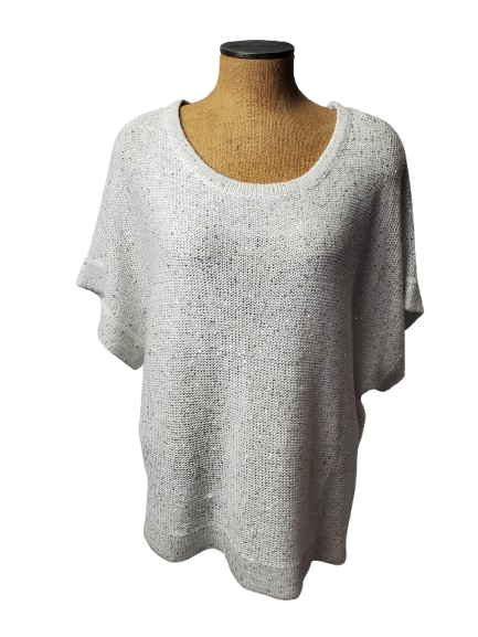 Loose-fitting gray sweater on a mannequin against a white background