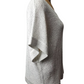 Mannequin wearing a textured gray sweater on a white background