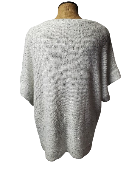 Gray sweater on a mannequin against a white background