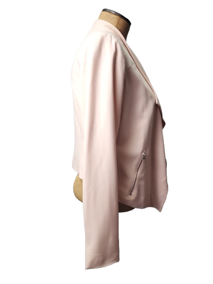 Pink jacket on a mannequin against a white background