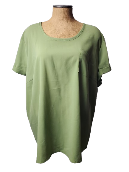 Green blouse on a mannequin against a white background