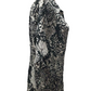 Black and white patterned shirt on a mannequin against a white background