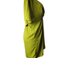 Green dress on a mannequin against a white background