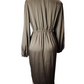 Brown dress on a mannequin against a white background