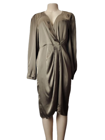 Gold satin dress on a mannequin against a white background