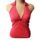 Red halter top on a mannequin against a white background