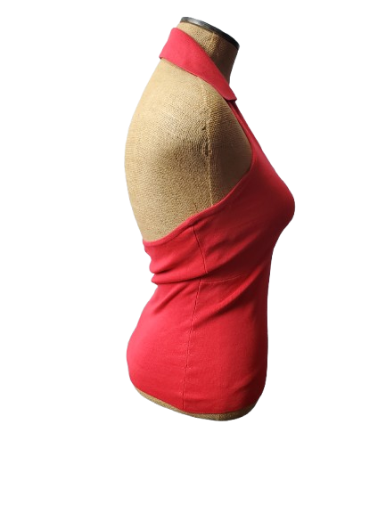 Red tank top on a mannequin with a beige back against a white background