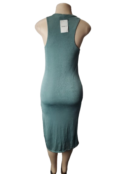 patima green dress on a mannequin with a white background