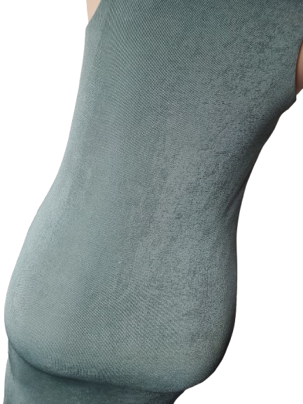 Close-up of a textured green sock on a white background