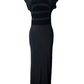Black evening gown on a mannequin against a white background