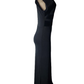 Black evening gown on a mannequin against a white background