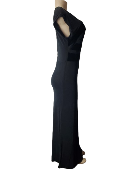 Black evening gown on a mannequin against a white background
