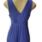 purple dress on a mannequin against a white background