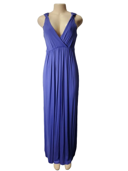 puple evening gown on a mannequin against a white background