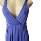 purple dress on a mannequin against a white background