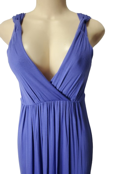purple dress on a mannequin against a white background