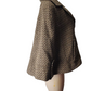 Brown herringbone patterned coat on a mannequin against a white background