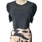 Black top with puff sleeves on a mannequin against a white background