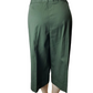 Green capris on a mannequin against a white background