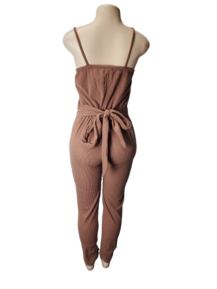 Brown ribbed jumpsuit on a mannequin against a white background