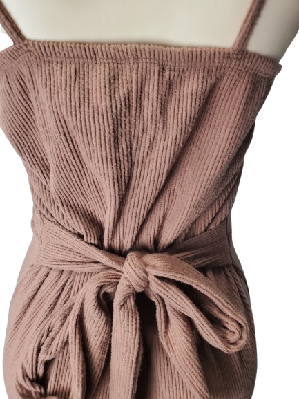 Brown ribbed knit dress with a tie waist on a mannequin against a white background