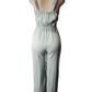 Light green jumpsuit on a mannequin against a white background