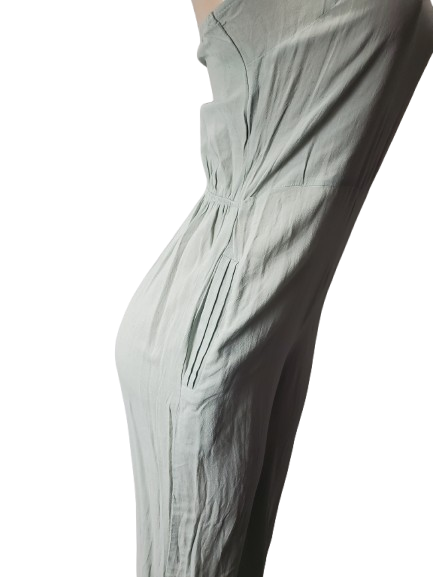 Light green strapless jumpsuit on a white background