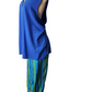 Blue top and colorful pants on a mannequin against a white background