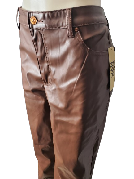 Brown leather pants with a visible brand tag on a white background