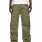 Person wearing green cargo pants and white shirt on a white background